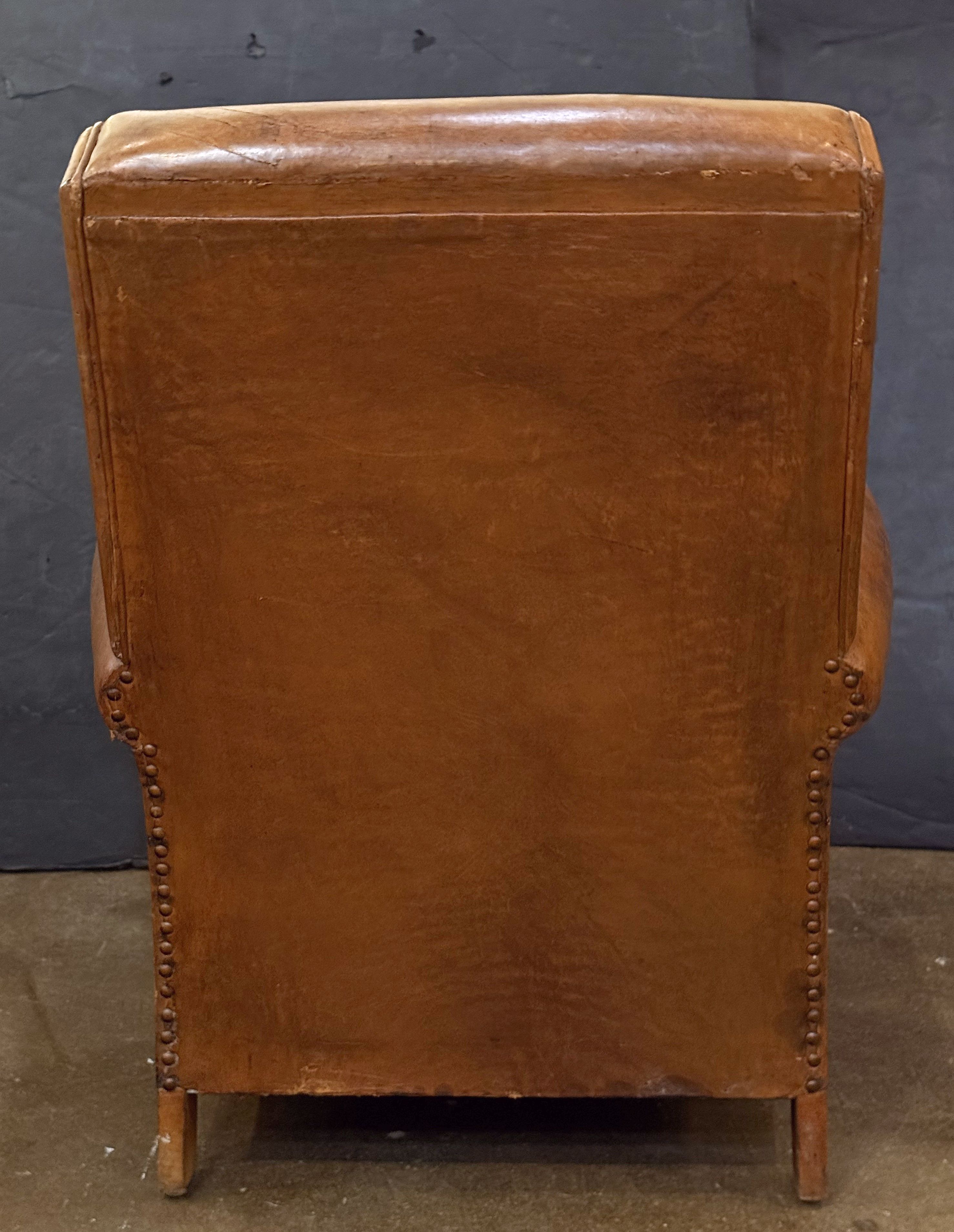 gg003_b_pair_of_leather_club_chairs_51_copy